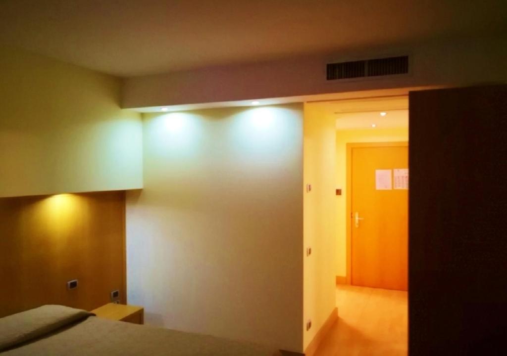 Postel nebo postele na pokoji v ubytování Hotel Ristorante Trendy