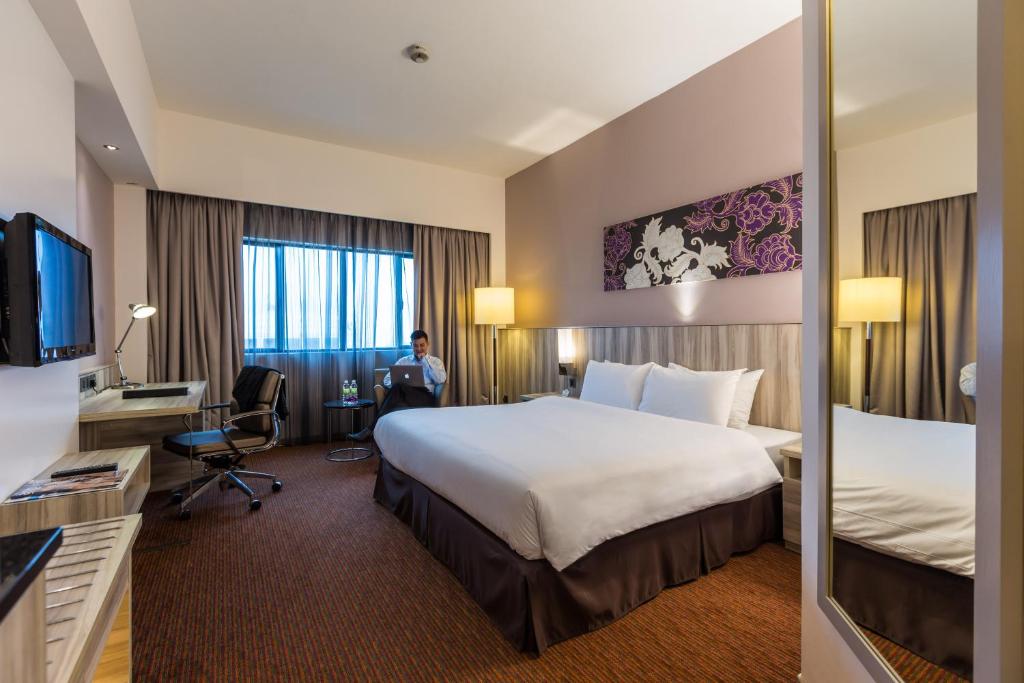 Postel nebo postele na pokoji v ubytování Sunway Hotel Seberang Jaya