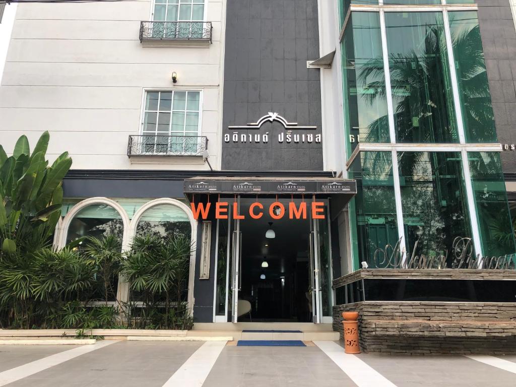 a welcome sign on the front of a building at Atikarn Princess Hotel & Resort in Udon Thani