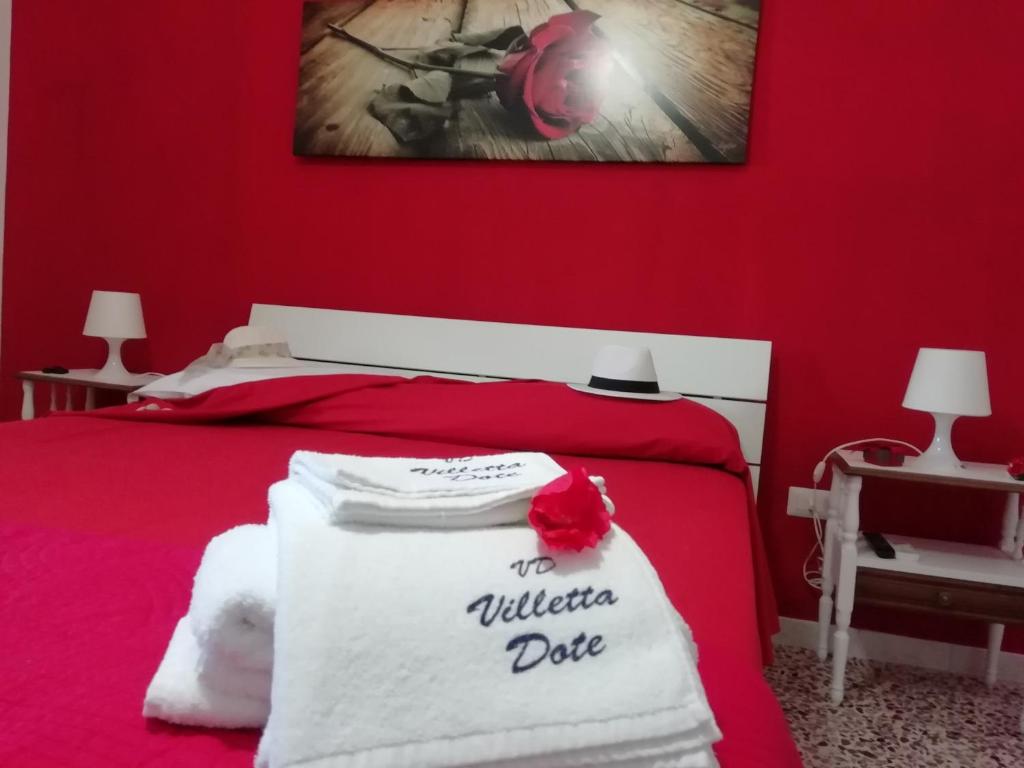 Posteľ alebo postele v izbe v ubytovaní Villetta Dote