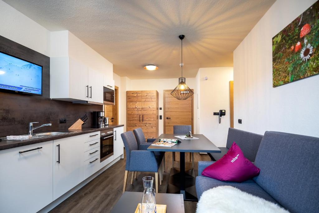 Kuchyň nebo kuchyňský kout v ubytování Alpin Chalet am Burgsee