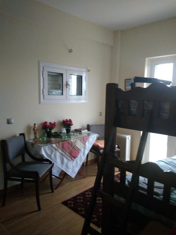 Postel nebo postele na pokoji v ubytování Panaritis