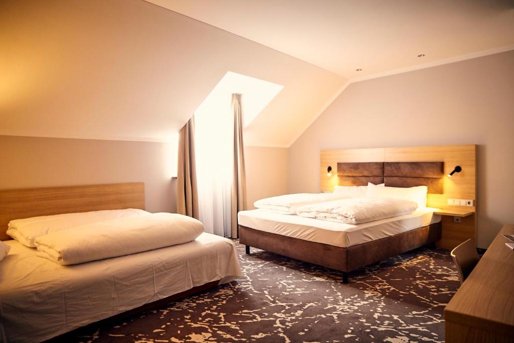 Postel nebo postele na pokoji v ubytování Bed&Breakfast Erber