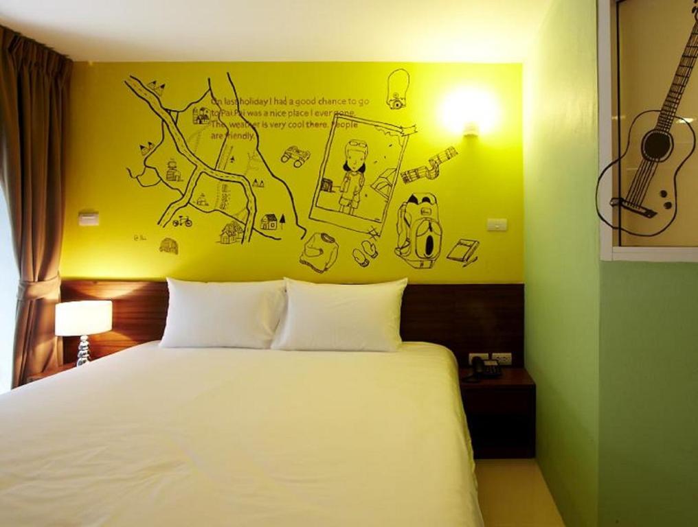 Postel nebo postele na pokoji v ubytování Loft 77