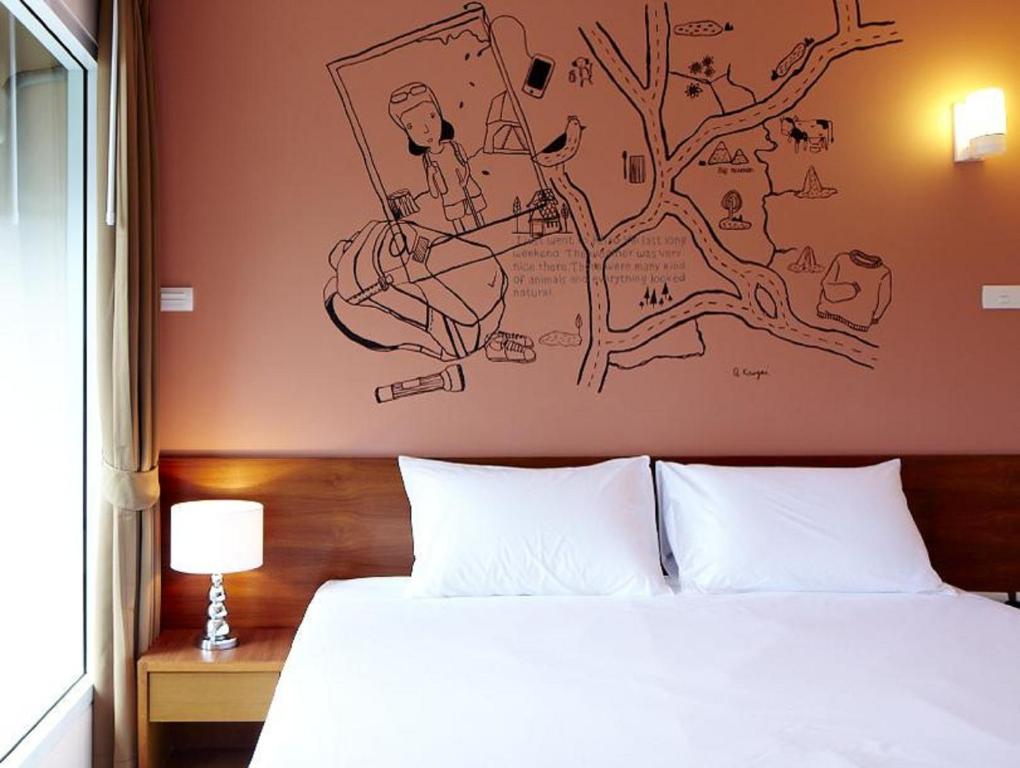 Postel nebo postele na pokoji v ubytování Loft 77