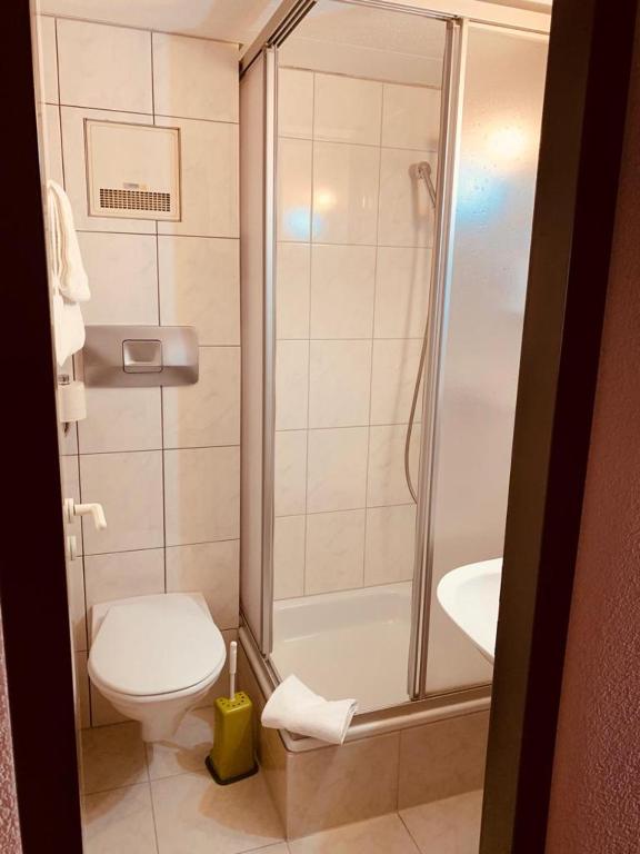 Koupelna v ubytování Hotel Lyssach