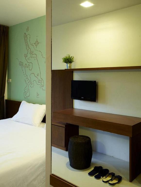 Postel nebo postele na pokoji v ubytování Loft 77