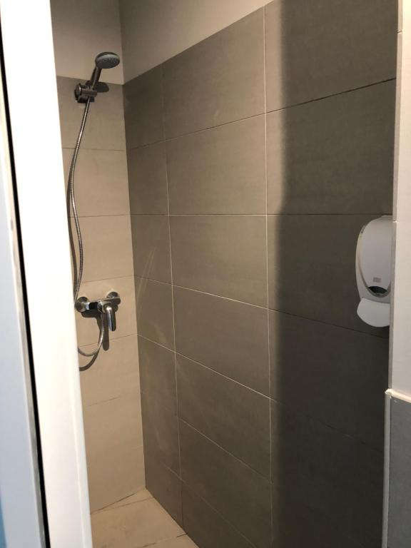Koupelna v ubytování PLAN B City Center Aparthotel