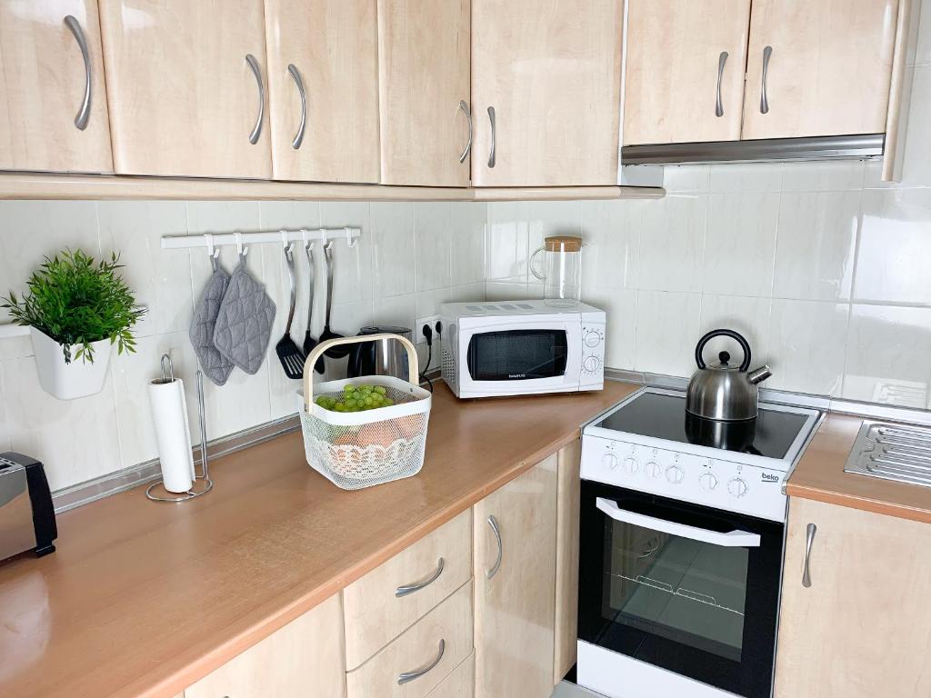 Kuchyň nebo kuchyňský kout v ubytování COSY FLATS BENIDORM CENTRO 2º