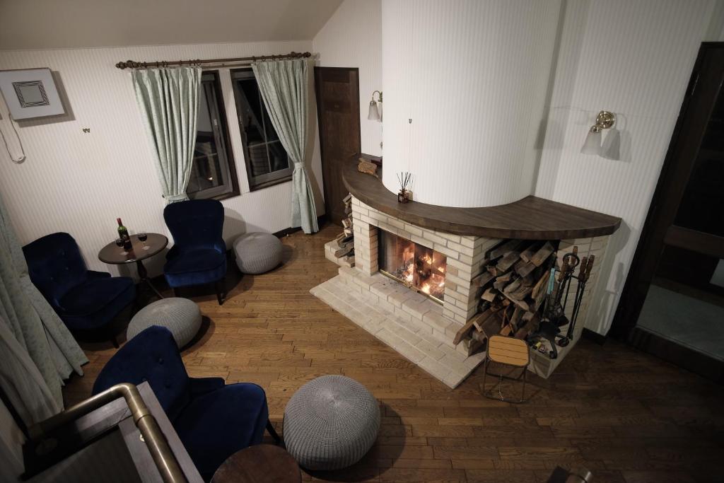 Posezení v ubytování Legend Inn Myoko