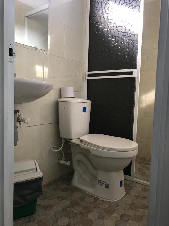 Koupelna v ubytování Hotel Maxim