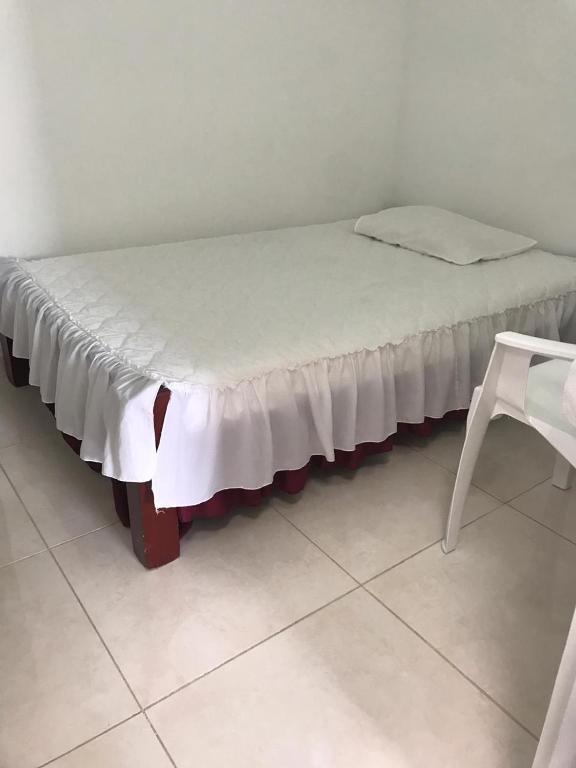 Postel nebo postele na pokoji v ubytování Hotel Maxim
