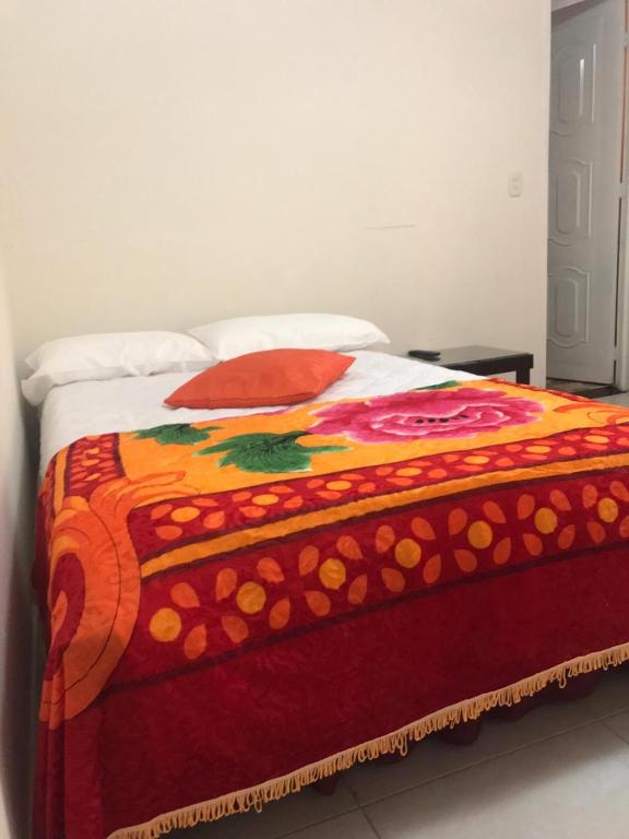 Postel nebo postele na pokoji v ubytování Hotel Maxim