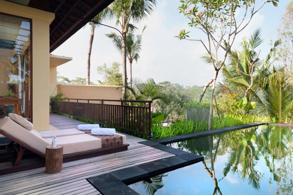 Bazén v ubytování Komaneka at Tanggayuda Ubud nebo v jeho okolí