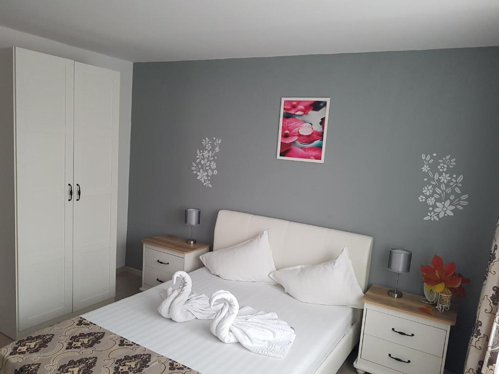 Postel nebo postele na pokoji v ubytování Hotel Dacor