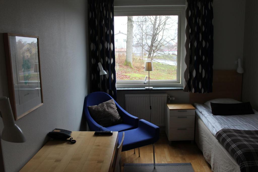 Postel nebo postele na pokoji v ubytování Hotell Åsen