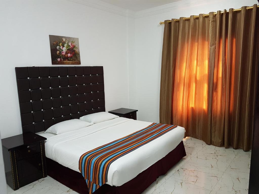 Voodi või voodid majutusasutuse Sea Hotel Apartment toas