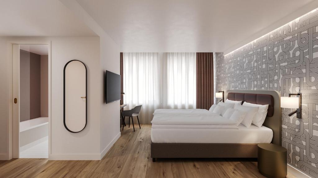 Postel nebo postele na pokoji v ubytování Hotel Walhalla