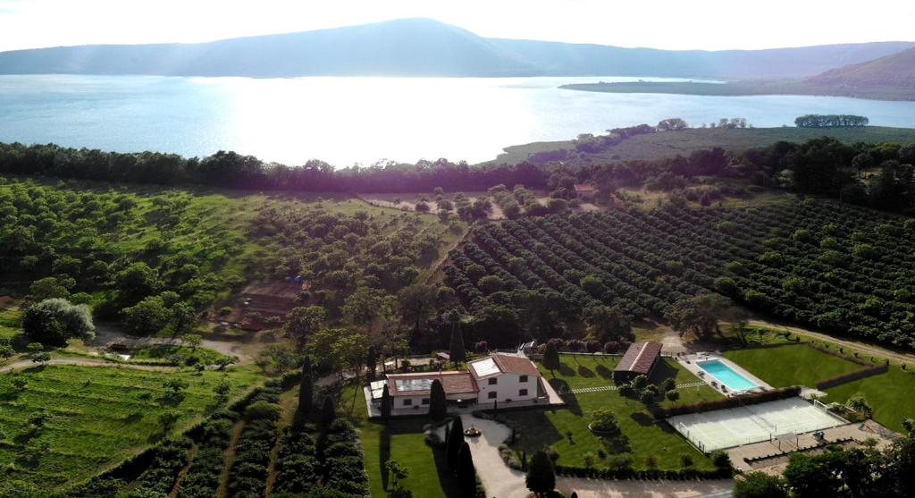 an aerial view of a estate with a lake at Agriturismo Ferrari in Caprarola