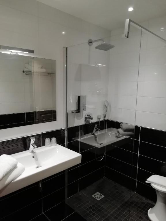 Koupelna v ubytování Hotel Blanc