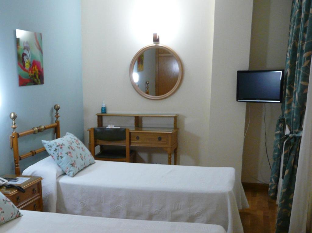 Postel nebo postele na pokoji v ubytování Hotel Nice