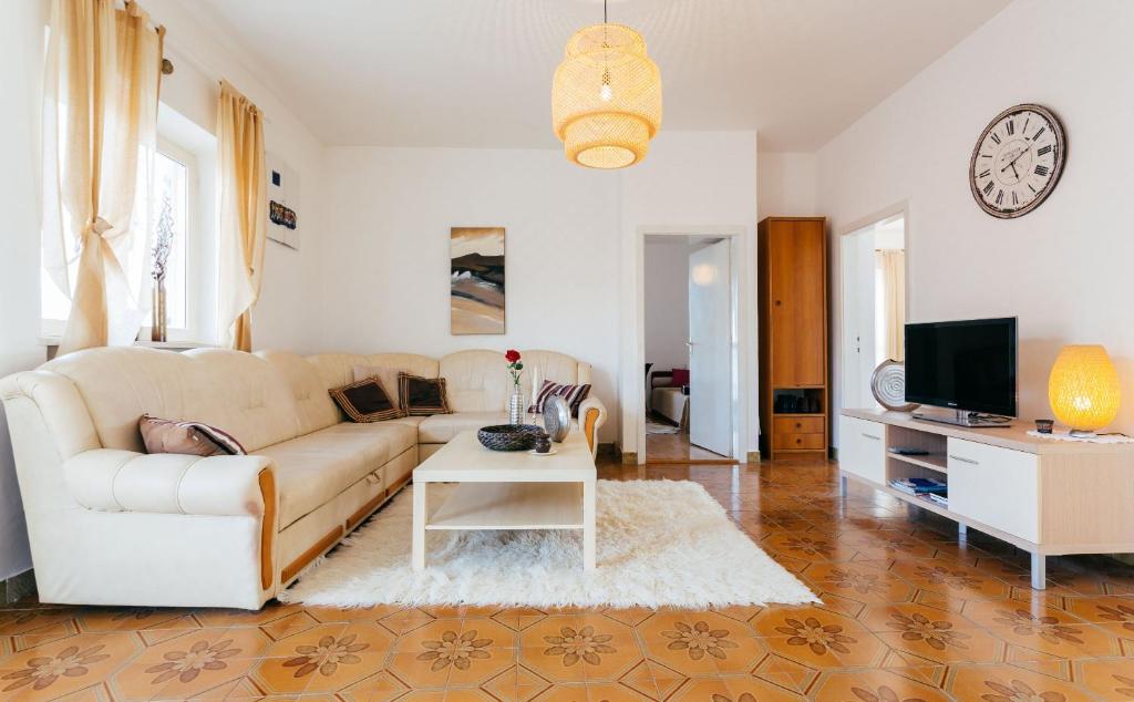 Televízia a/alebo spoločenská miestnosť v ubytovaní Apartment THE VIEW