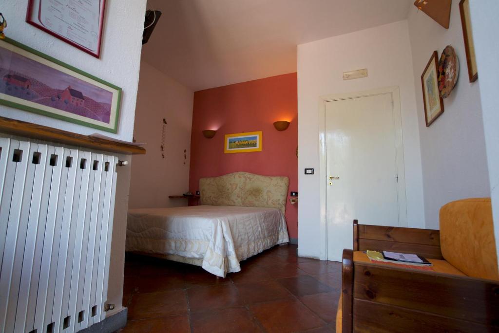 Postel nebo postele na pokoji v ubytování La Dimora le Fumarole Rooms
