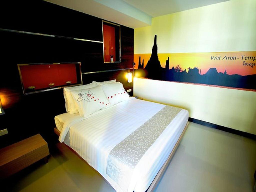 Postel nebo postele na pokoji v ubytování Ds67 Suites