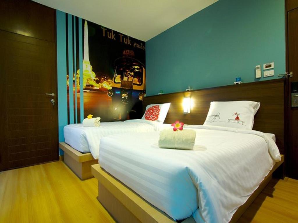 Postel nebo postele na pokoji v ubytování Ds67 Suites