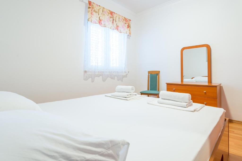 Posteľ alebo postele v izbe v ubytovaní Apartment Miha Marusic