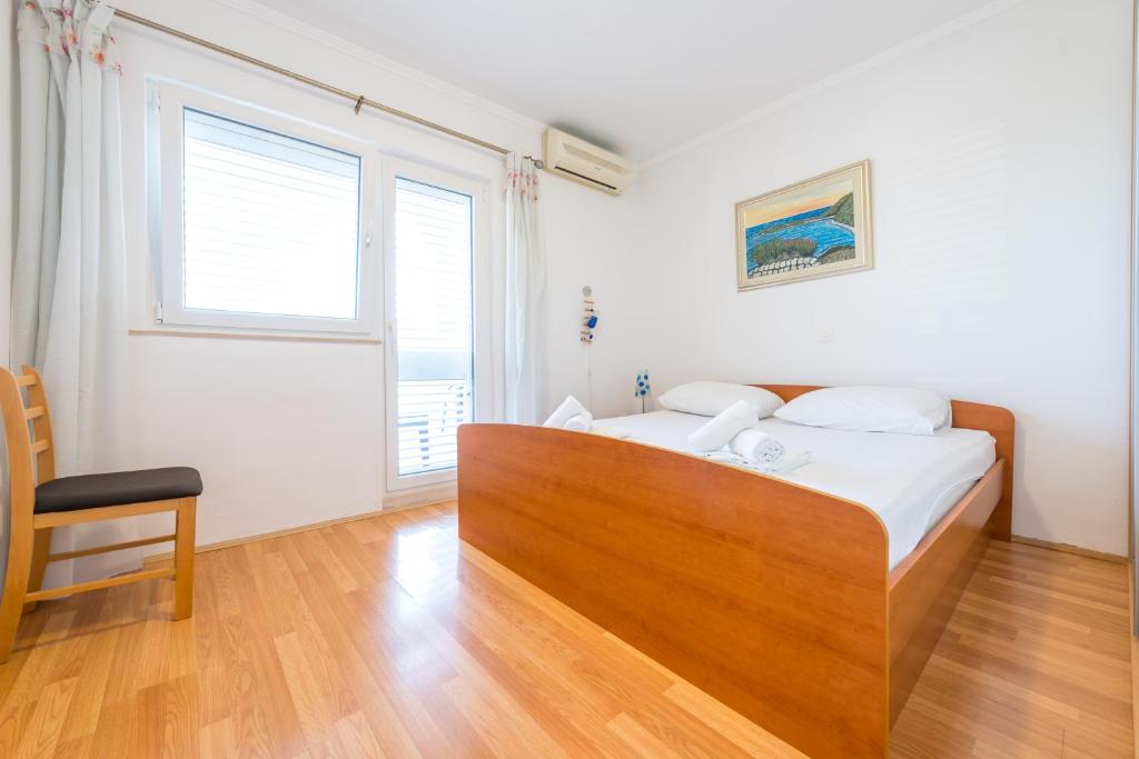 Posteľ alebo postele v izbe v ubytovaní Apartment Miha Marusic