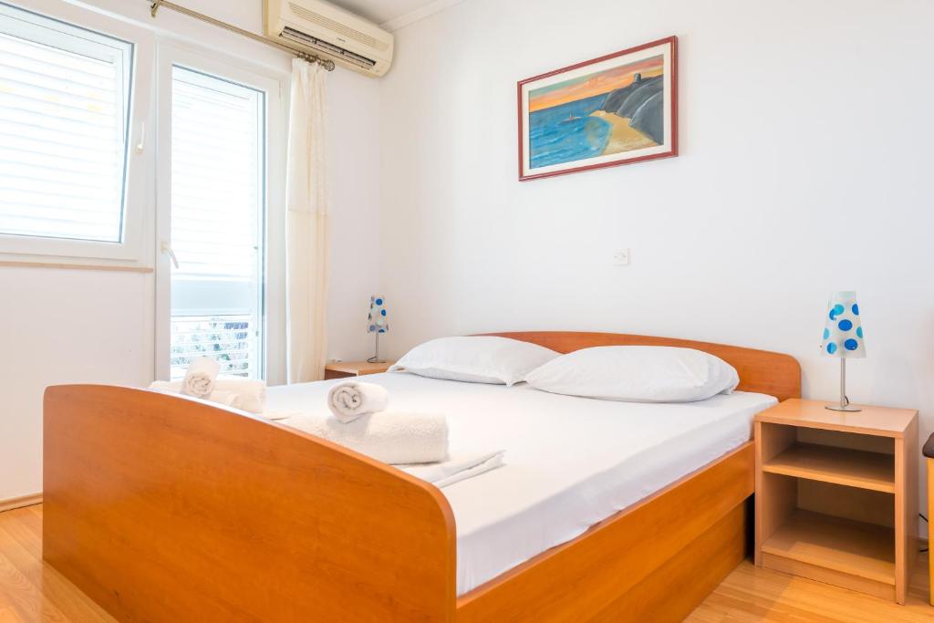 Posteľ alebo postele v izbe v ubytovaní Apartment Miha Marusic