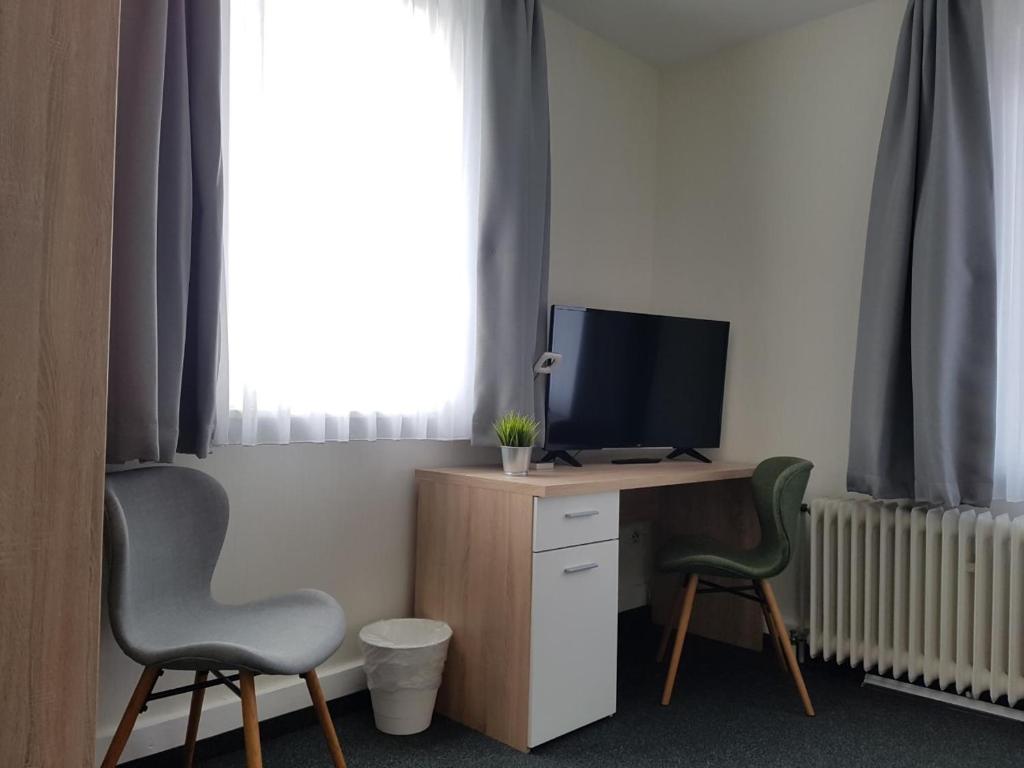 TV a/nebo společenská místnost v ubytování Hotel Silbertanne