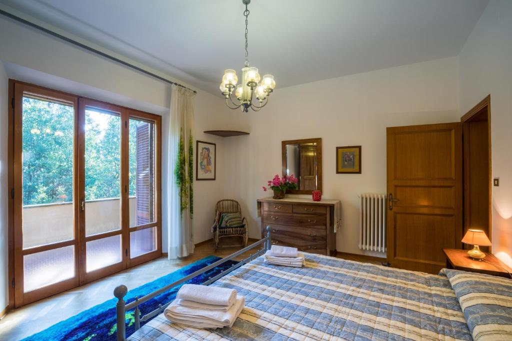 Postel nebo postele na pokoji v ubytování Villa Giulia