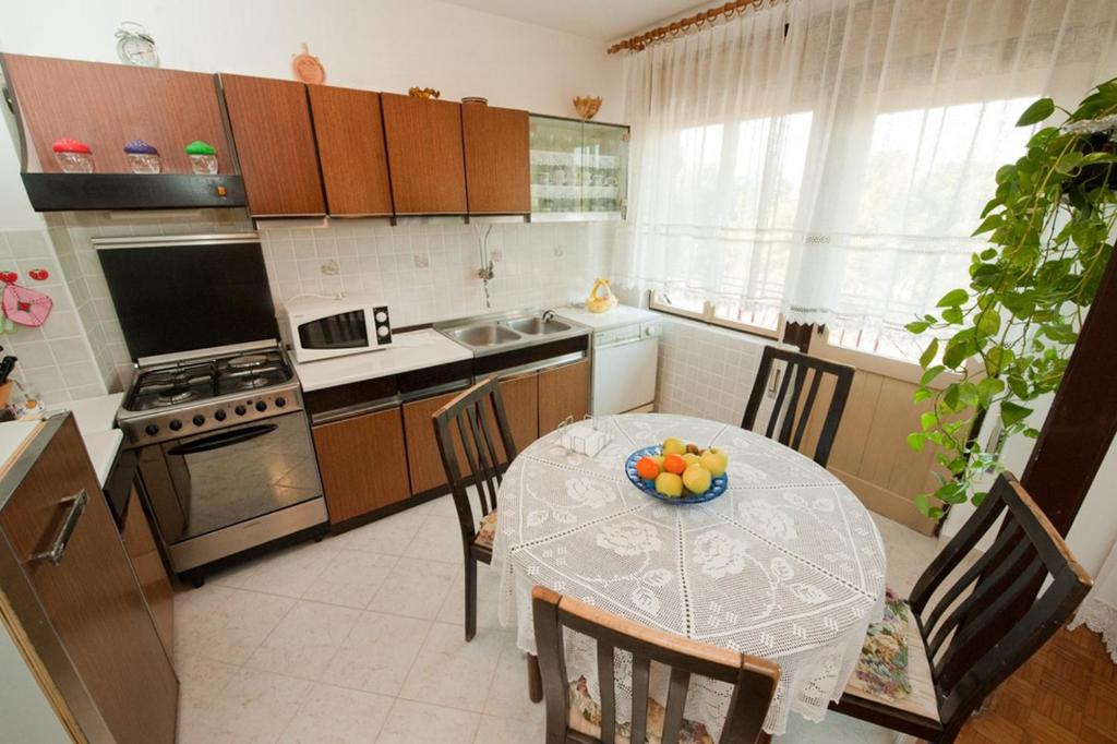 Kuchyň nebo kuchyňský kout v ubytování Apartment Patricia