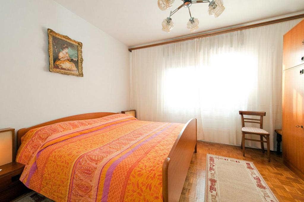 Postel nebo postele na pokoji v ubytování Apartment Patricia