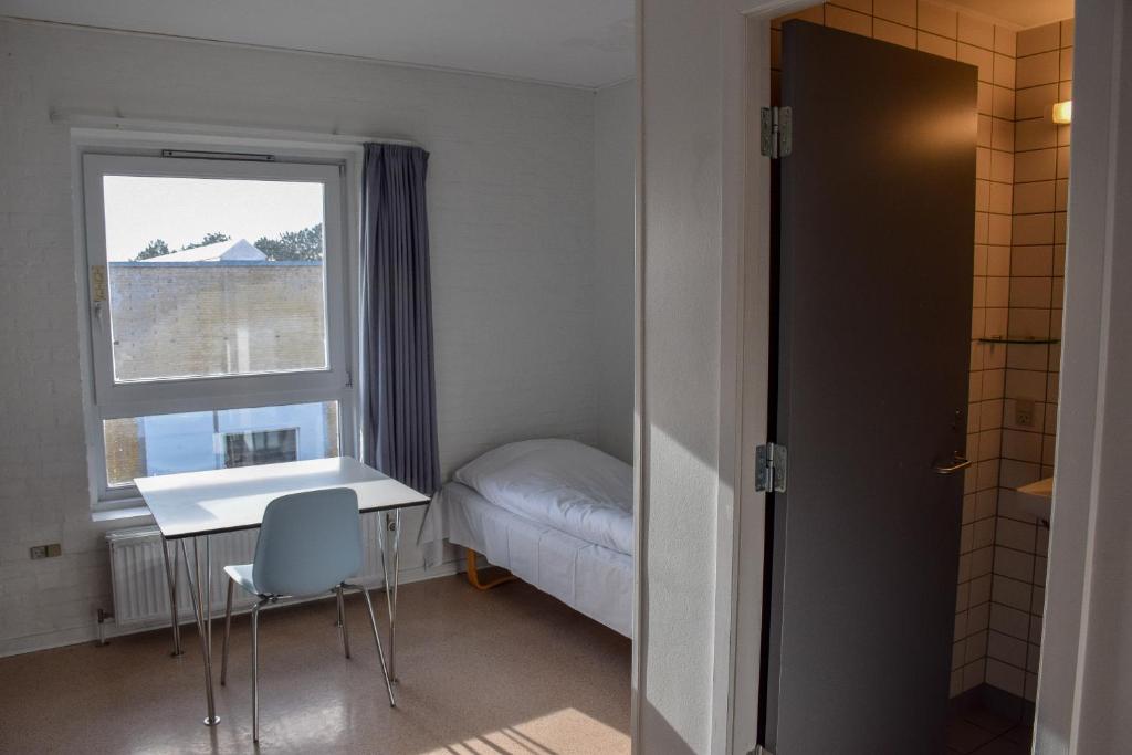 Postel nebo postele na pokoji v ubytování Danhostel Nørresundby Skansen