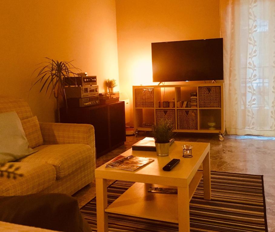 Televízia a/alebo spoločenská miestnosť v ubytovaní B&B AMICI MIEI