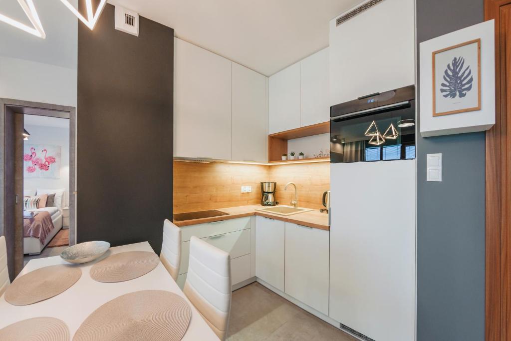 Apartamenty Sun & Snow Kołobrzeg Resorts z basenem - Deluxe Apartment