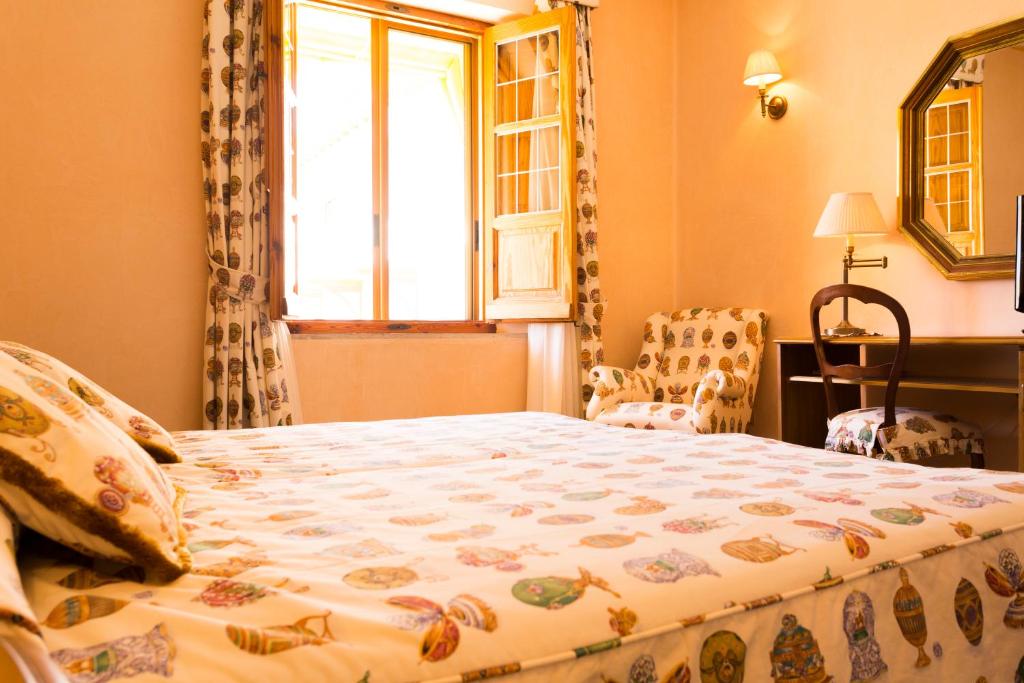 Postel nebo postele na pokoji v ubytování Hotel Torremilanos