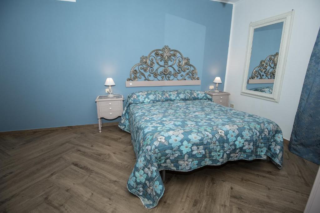 A bed or beds in a room at Matilde