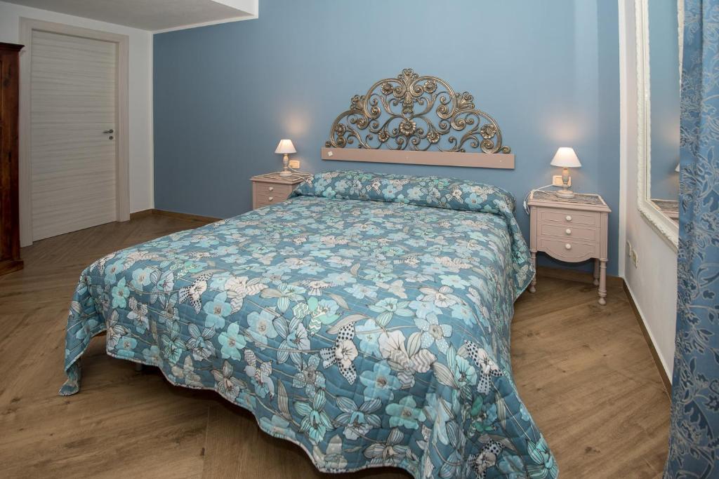 A bed or beds in a room at Matilde