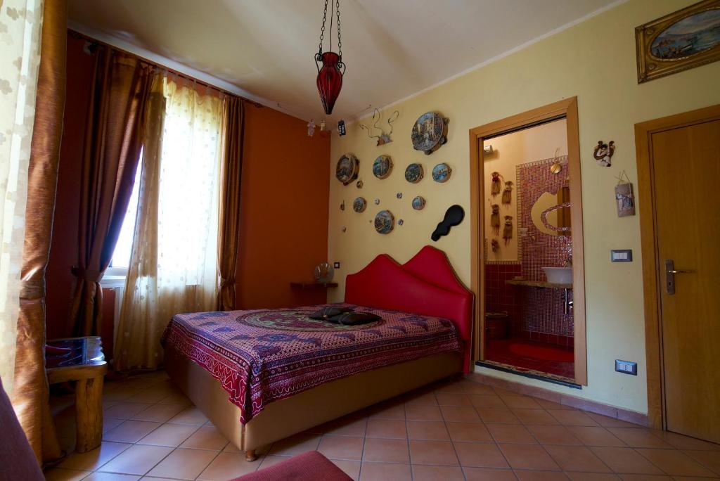 Postel nebo postele na pokoji v ubytování La Dimora le Fumarole Rooms