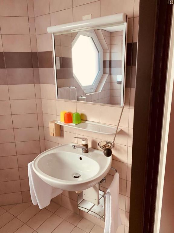 Koupelna v ubytování Hotel Lyssach