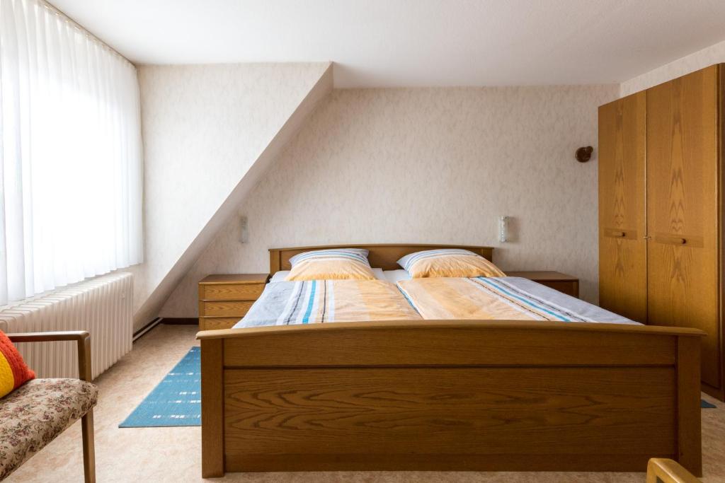 Postel nebo postele na pokoji v ubytování Gasthaus Dernedde