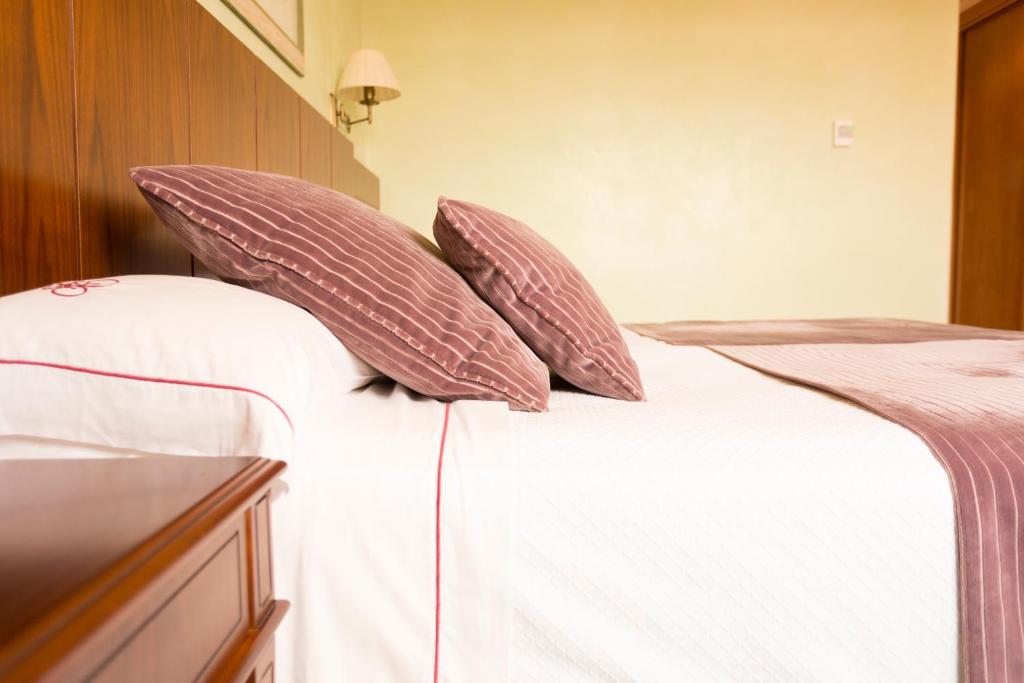 Postel nebo postele na pokoji v ubytování Hotel Torremilanos
