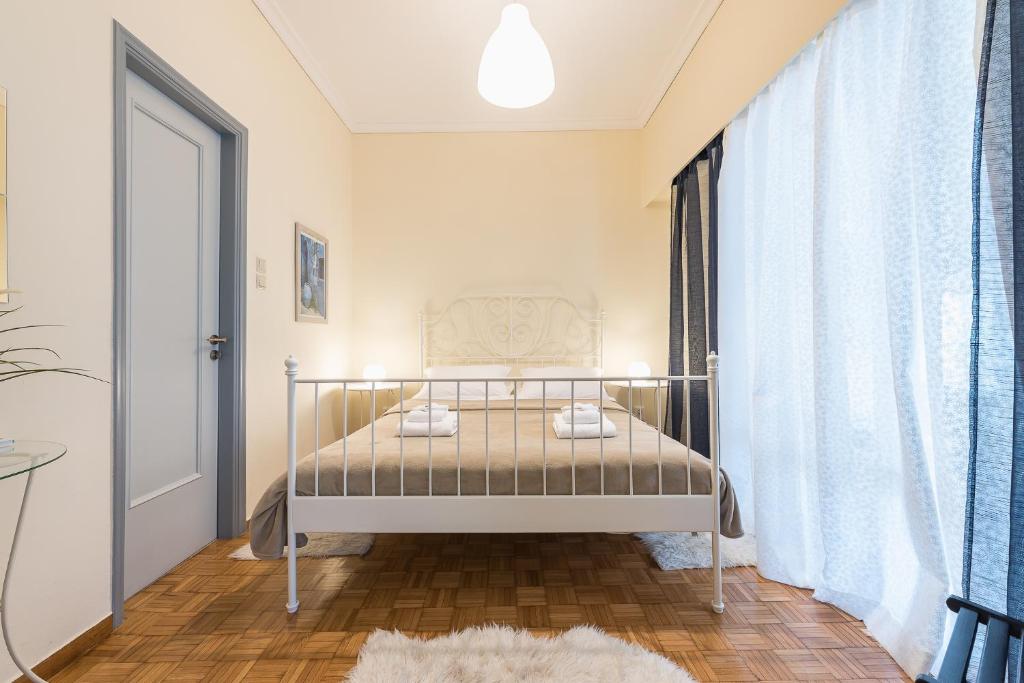 Posteľ alebo postele v izbe v ubytovaní My Athens Gem