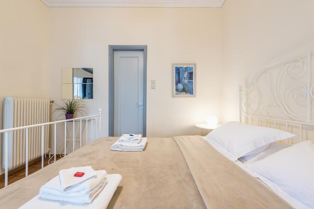 Posteľ alebo postele v izbe v ubytovaní My Athens Gem