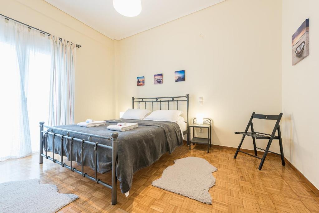 Posteľ alebo postele v izbe v ubytovaní My Athens Gem