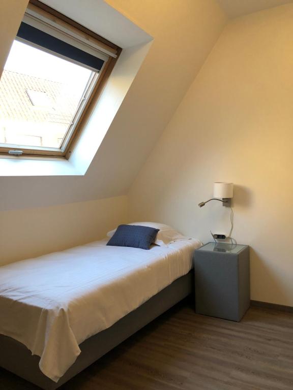 Postel nebo postele na pokoji v ubytování Hotel Asiris
